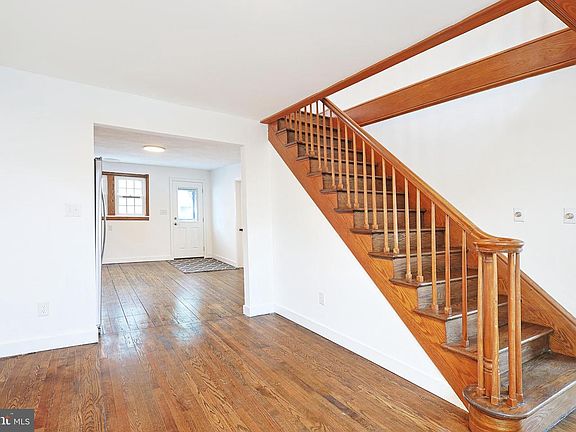 Wood staircase and renovated entry